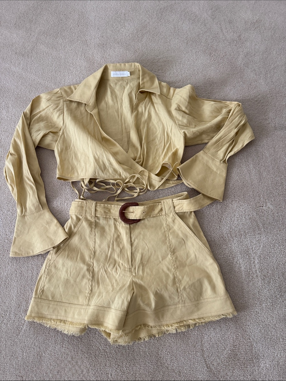 Jonathan Simkhai top and shorts, light mustard color.